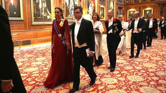 Britain's Catherine, Princess of Wales (L), President of France's Mus�e d'Orsay Christophe Leribault (2L), France's Ambassador to the United Kingdom Helene Duchene (C) and by France's President Emmanuel Macron.s Prince Edward, Duke of Edinburgh arrive to attend a State Banquet at Windsor Castle, west of London.(AFP)