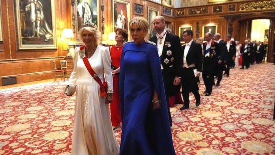 The Queen wore the Belgian Sapphire Tiara, which she first donned during the Republic of South Africa's State Banquet for President Cyril Ramaphosa in November 2022. She paired the sapphire bracelet, earrings, and necklace from Queen Elizabeth's collection with the tiara. Camilla also donned the new royal order of King Charles and an evening gown designed by Fiona Clare using silk crepe and ivory.(AFP)