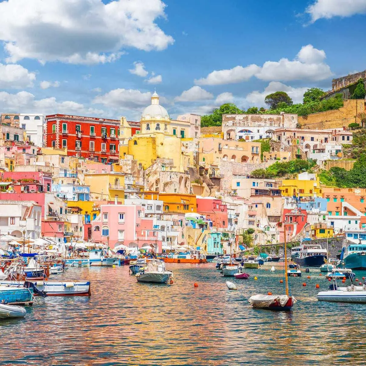 Colorful Houses Lining The Waterfront In Procida, Italy