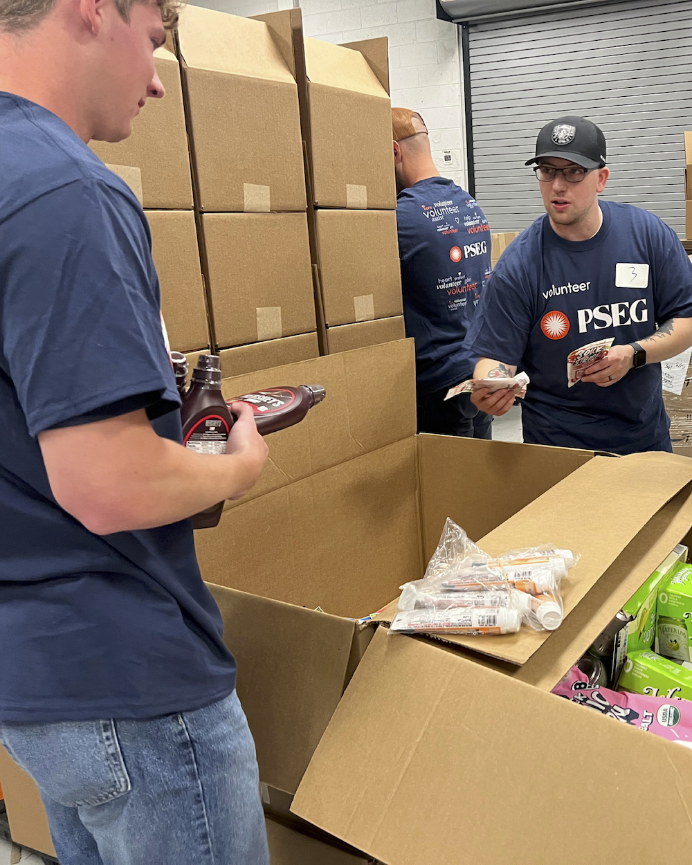 volunteers packing food
