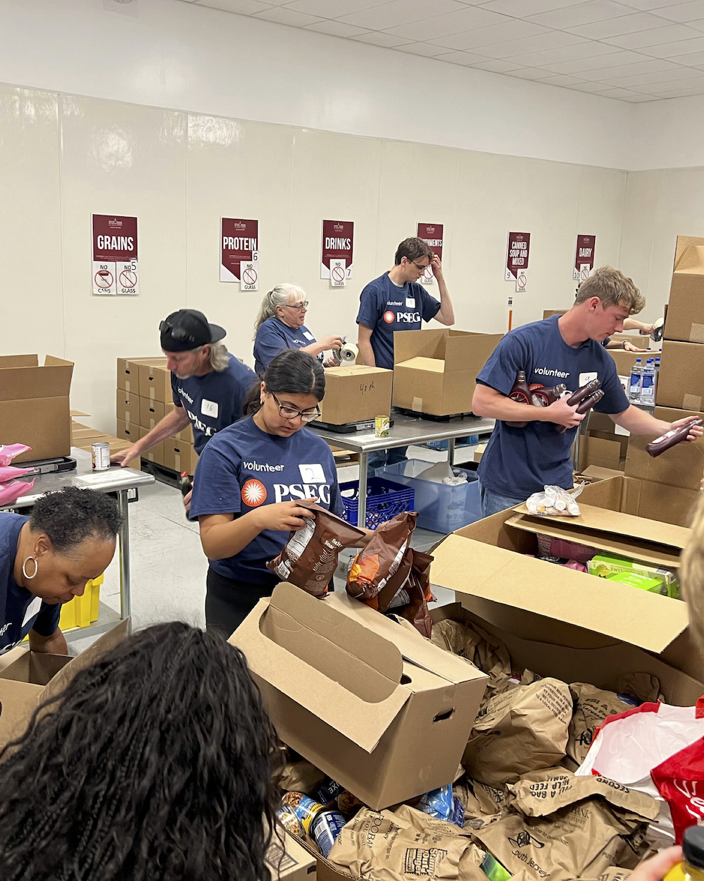 volunteers packing food