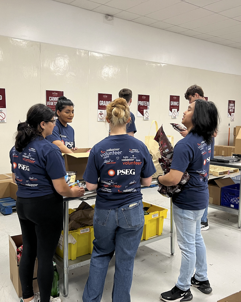 volunteers packing food