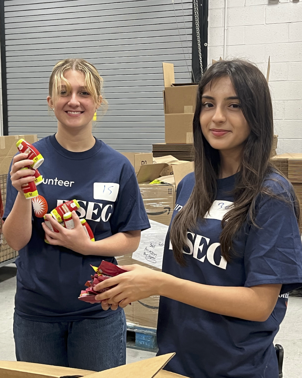 volunteers packing food