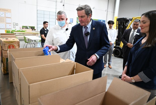 Congressman John Garamendi tours the Food Bank of Contra Costa/Solano after speaking out against what he calls "The Big Ugly Bill" that would cut funding to food programs across the nation. (Chris Riley/The Reporter)