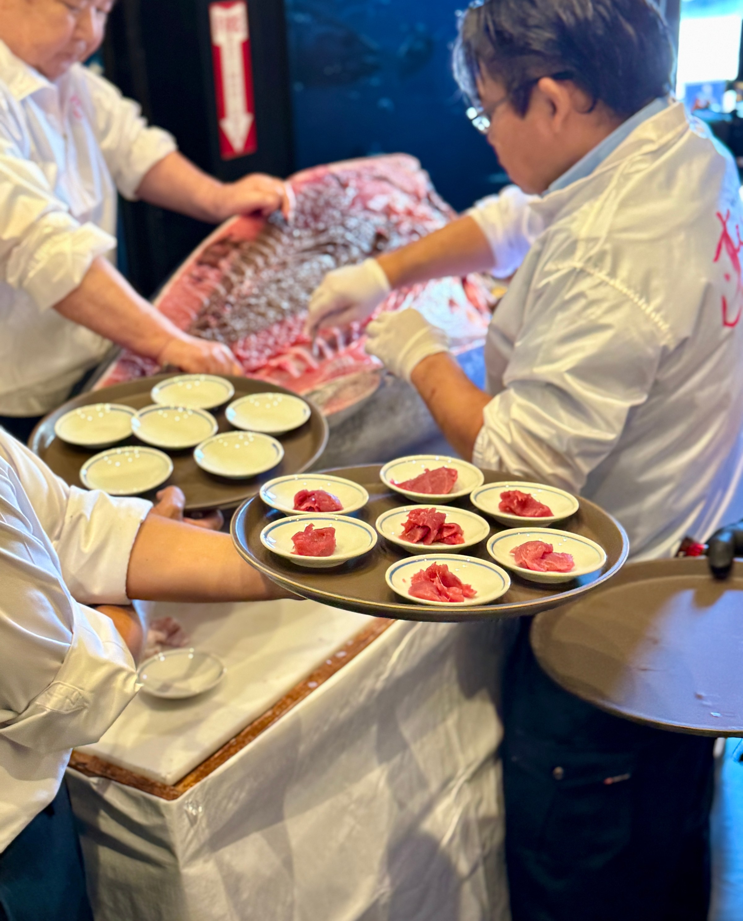 Tuna passed around at Sushi Zanmai’s opening.