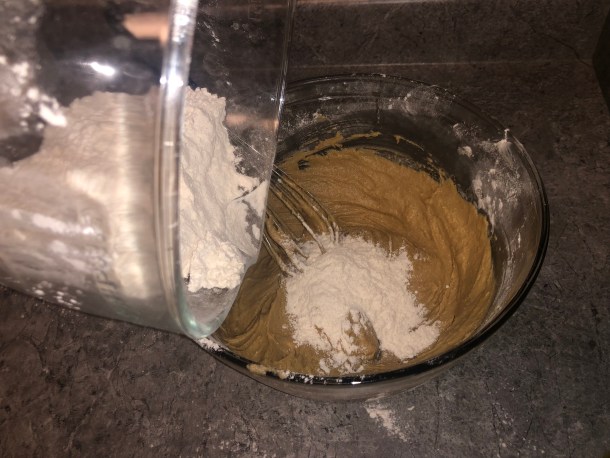 Adding in more flour.