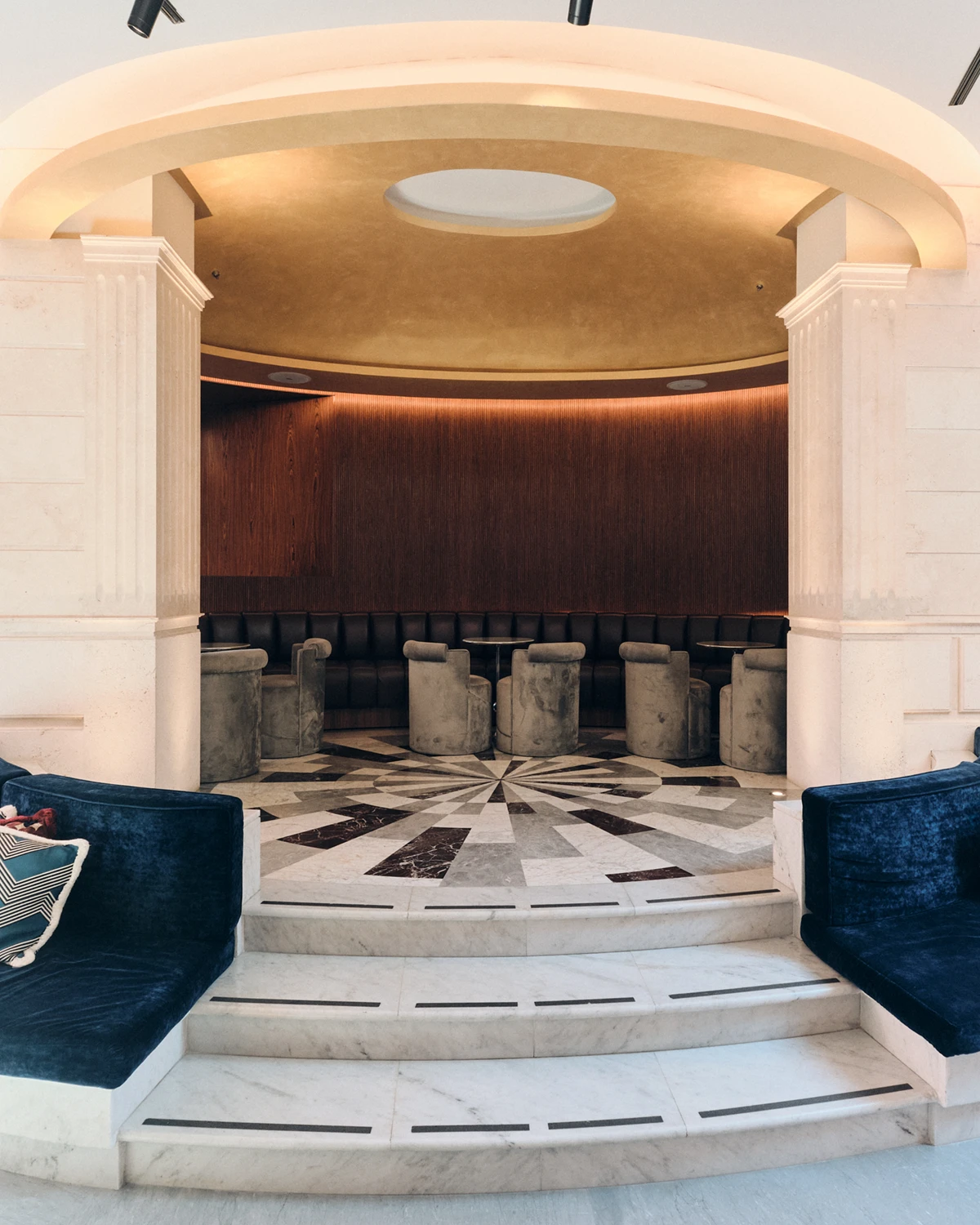 Marble steps and a golden dome set the stage for stylish gatherings at W Rome