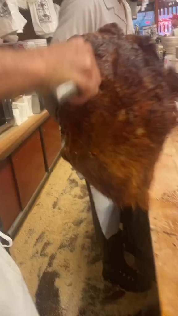 A sandwich being put together at Katz's Deli, Lower East Side, NYC.