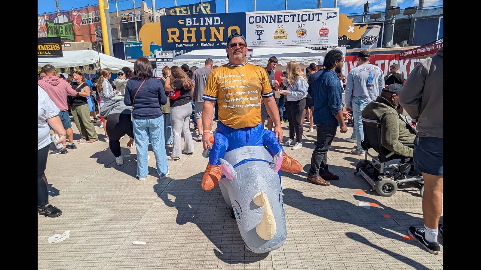 Yes, that's a man "riding" a rhinoceros to promote the Blind Rhino, a restaurant in Norwalk, Connecticut.