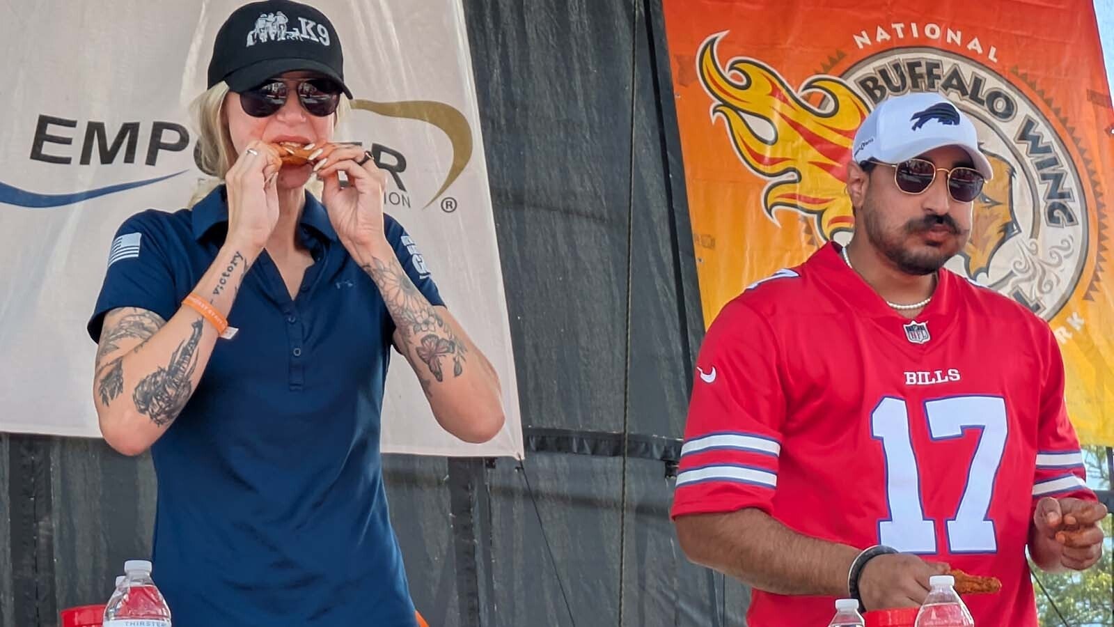 The winner of the "Armed Forces Wing Eating Contest" (L) polished off 18 wings in the allotted time.