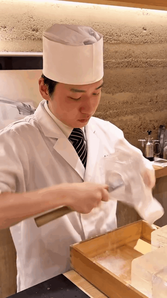 Cold noodles being served in hand-cut Ice Bowls in Japan