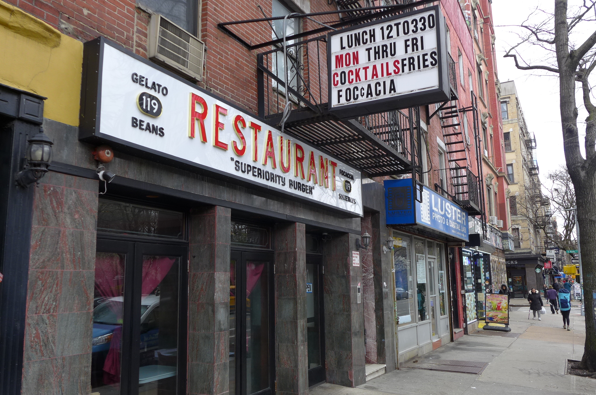 A facade with two white plastic signs.