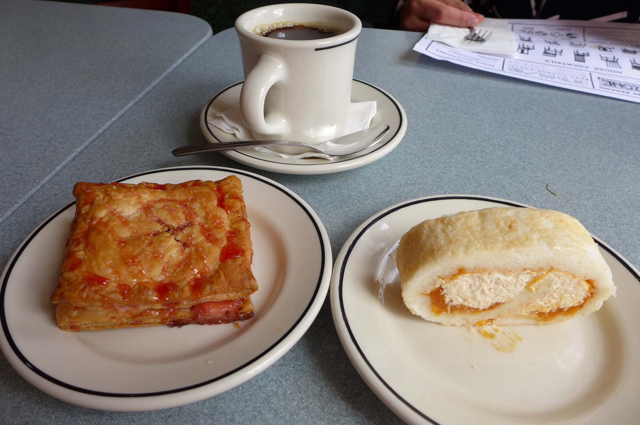 A cherry-rhubarb pastry and peanut butter and jelly roll.