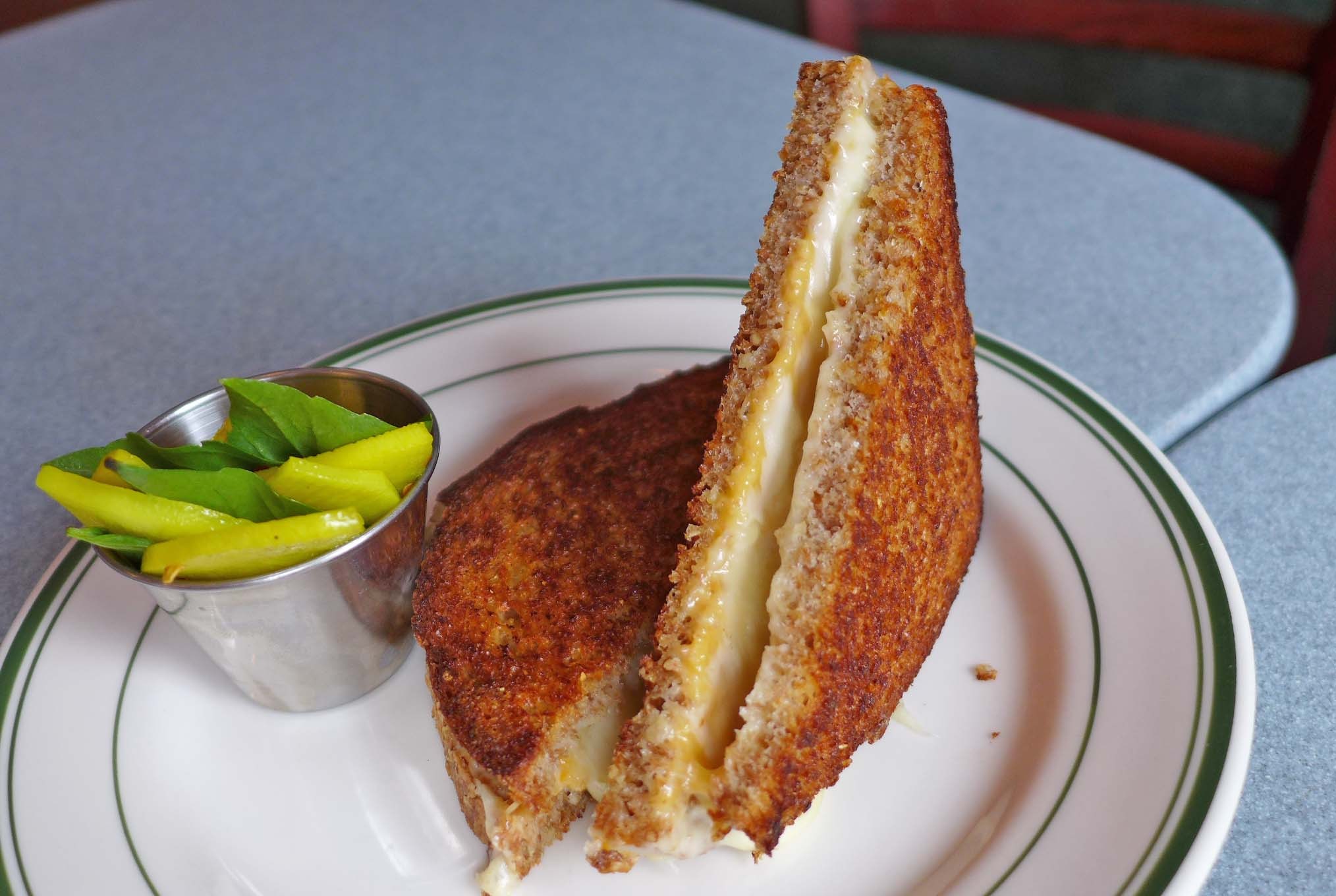 A thin browned sandwich turned on its end.