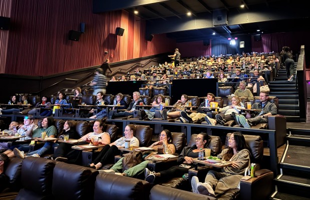 The audience enjoys the pre-show entertainment before Pruneyard Cinemas' screening of "Mean Girls," part of its Culinary Cinema program that pairs classic movies with three-course dinners, on Monday, Aug. 25, 2025 at the Pruneyard in Campbell. (Sal Pizarro/Bay Area News Group)