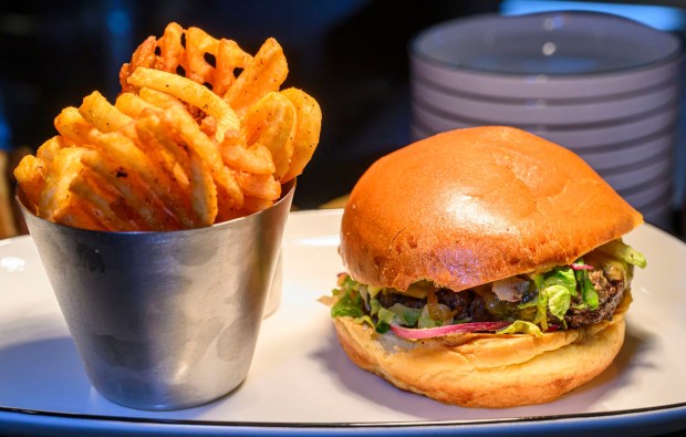 A Stack Burger — an angus patty, romaine, red onion...