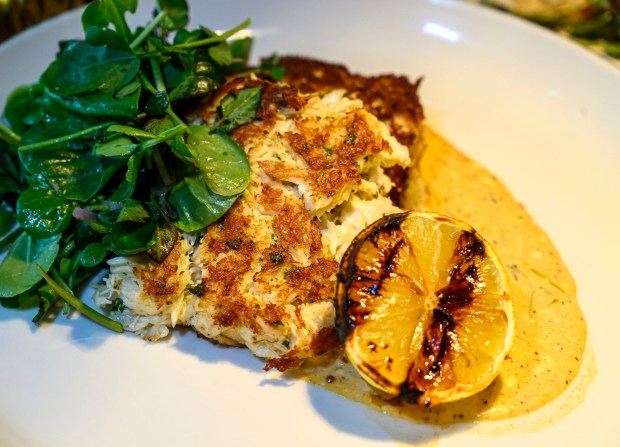 Crabcakes — old bay remoulade — is one of the...