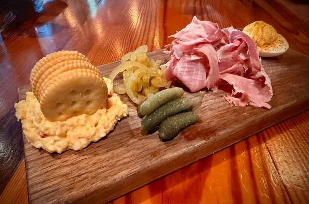 At Harper's Table in Suffolk, the Picnic Plate is a starter that includes a who's who of Deep South delicacies: deviled egg, country ham, pickles, and pimento cheese. (Patrick Evans-Hylton / freelance)