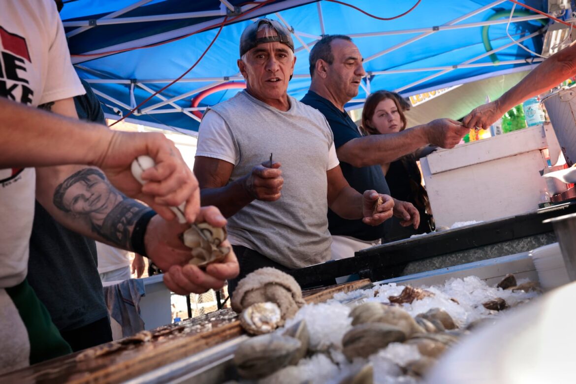 Rick Mirabella watched over the raw bar at his Boston Fried Calamari booth at St. Anthony's Feast in the North End.