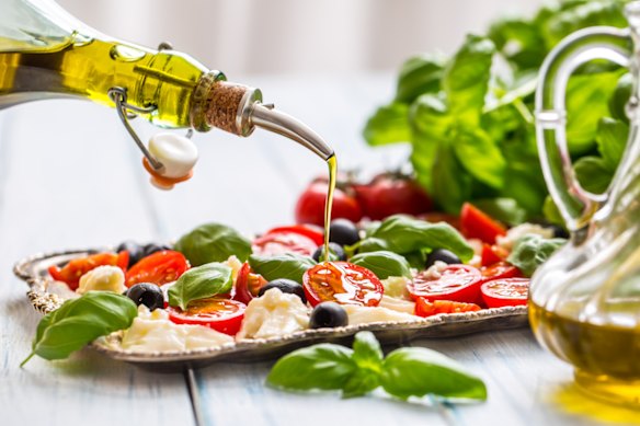 Extra virgin olive oil (EVOO) is the best choice for drizzling over salad.