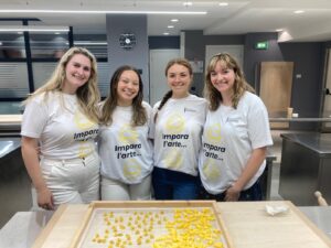 Jacqueline Welsh and her classmates in a cooking class.
