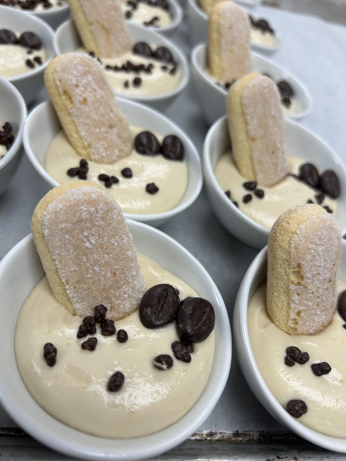 Tiramisu Mousse with lady fingers and chocolate covered espresso beans