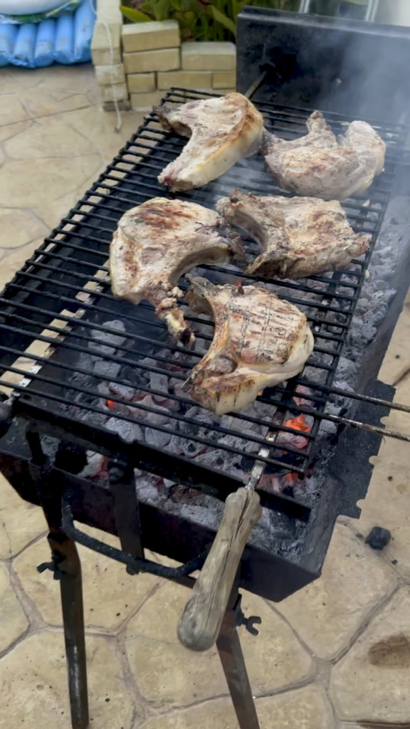 Some stonking pork chops grilling on a rather old bbq!!