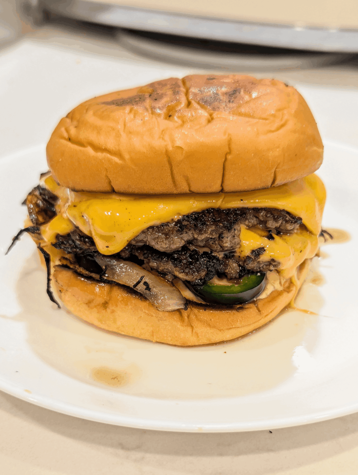 double oklahoma semi-smash with jalapenos & burger sauce