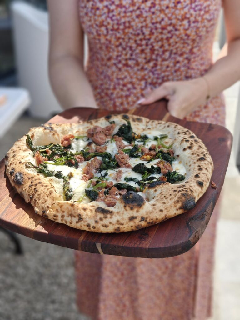 Salsiccia e friarielli, topped with fresh chili Salsiccia e friarielli, topped with fresh chili