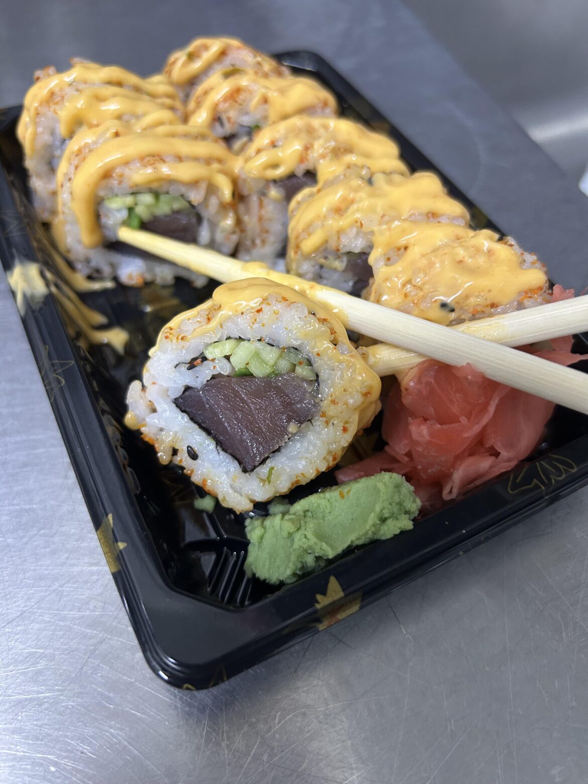 Is this dark tuna okay to eat? It tastes fine. Idk?