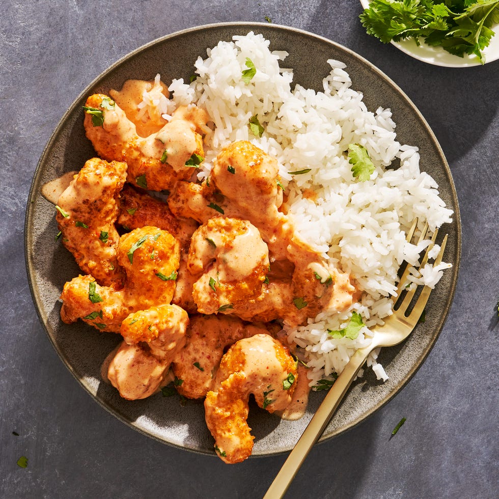 bang bang shrimp in a creamy spicy sauce with chopped cilantro
