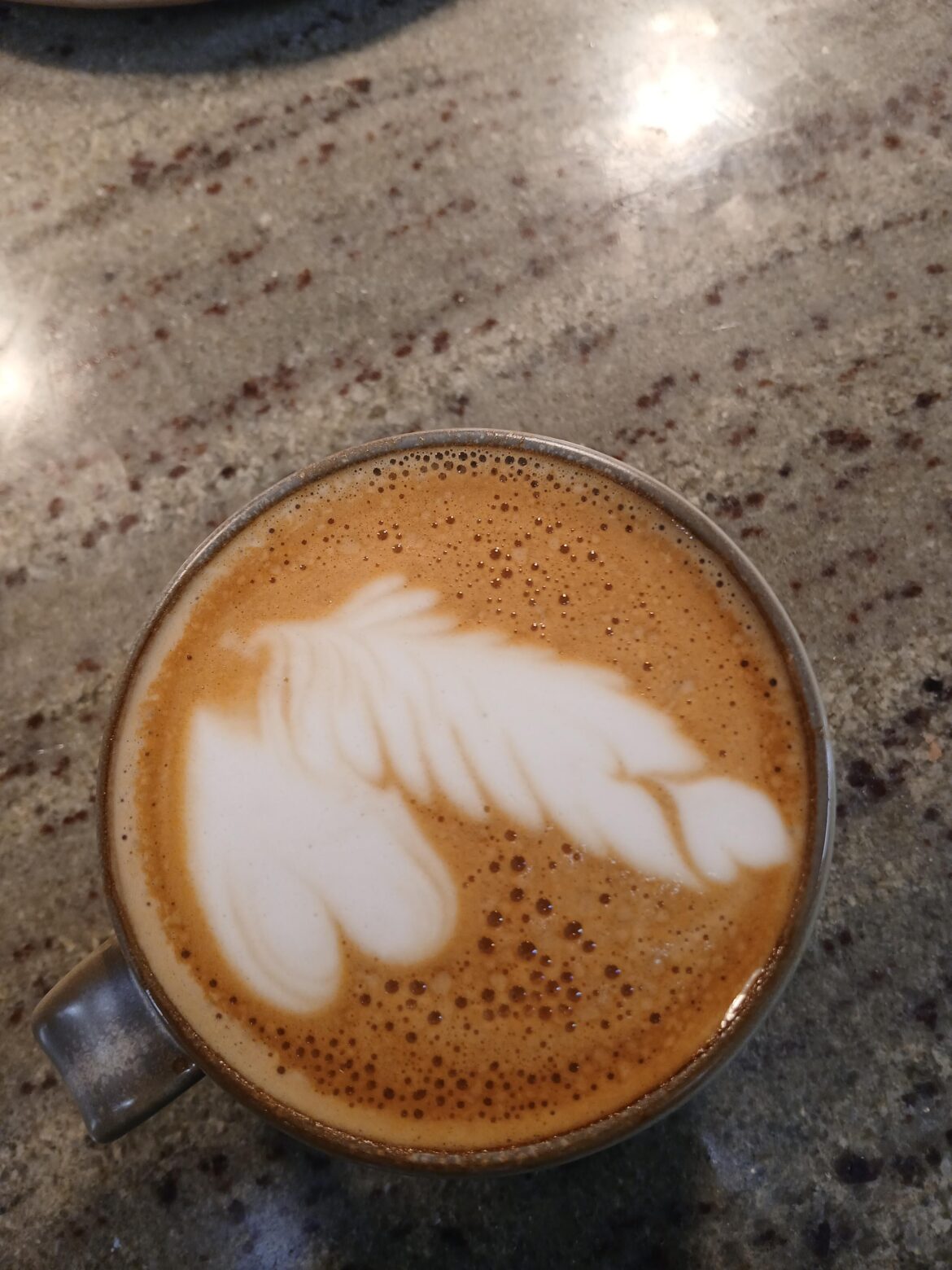 Barista at work specialises in making penis coffees for the kitchen
