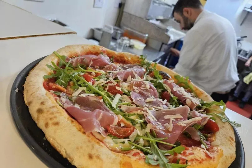 One of their pizzas, fresh out of the kitchen
