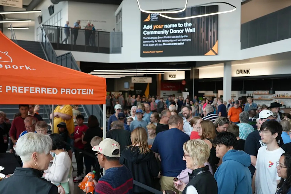 A crowd packs the Southeast Event Centre for its grand opening Aug. 21.