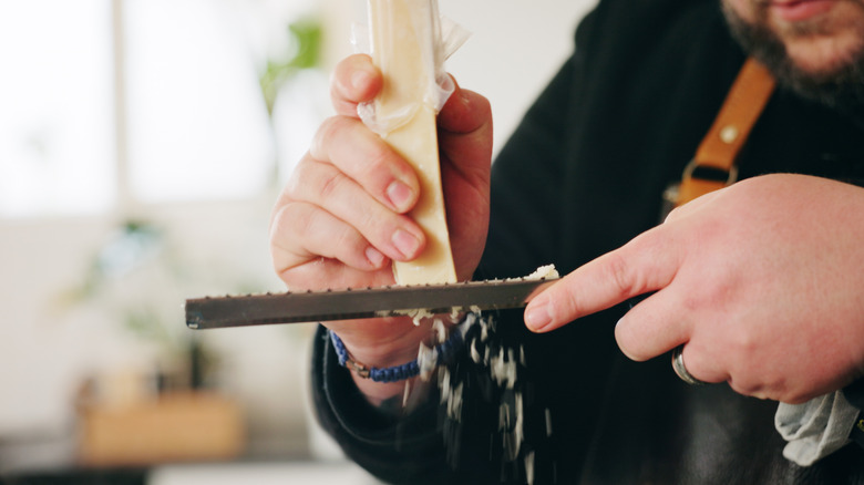 chef grating Parmesan