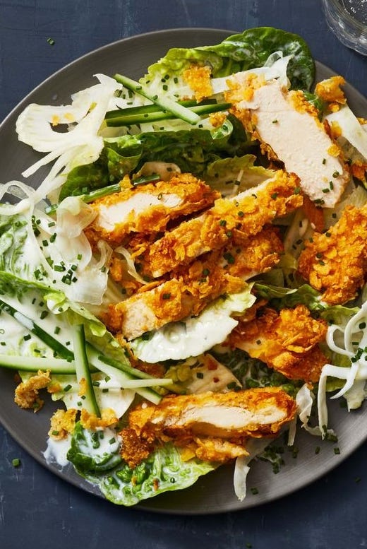 crispy chicken salad on a green salad