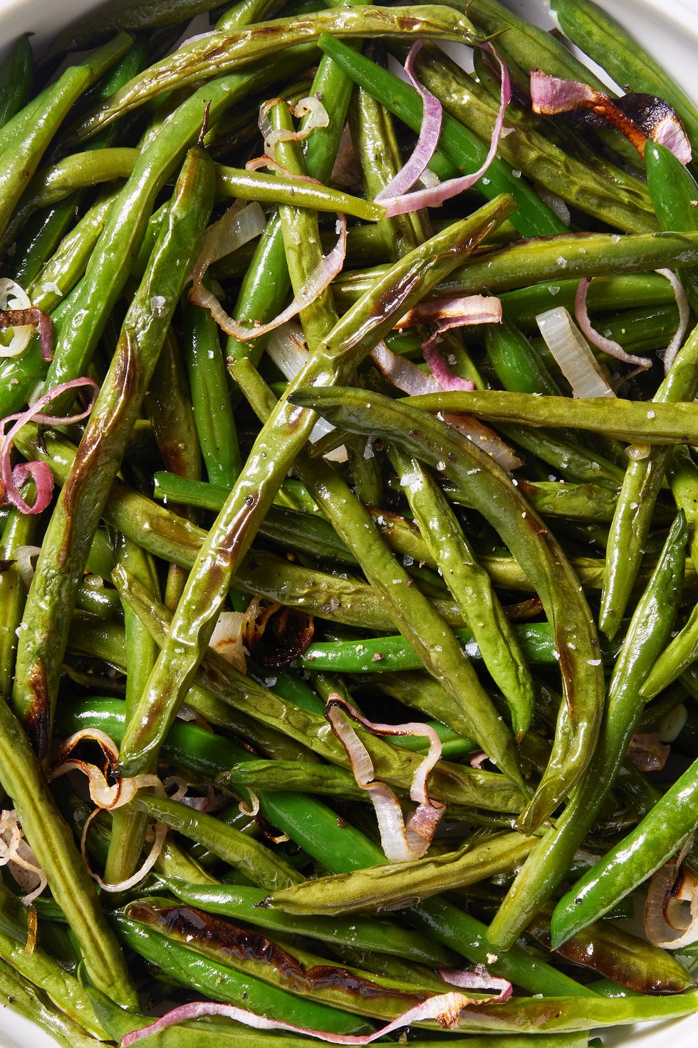 fresh green beans tossed with olive oil and shallots, then roasted until tender and lightly blistered