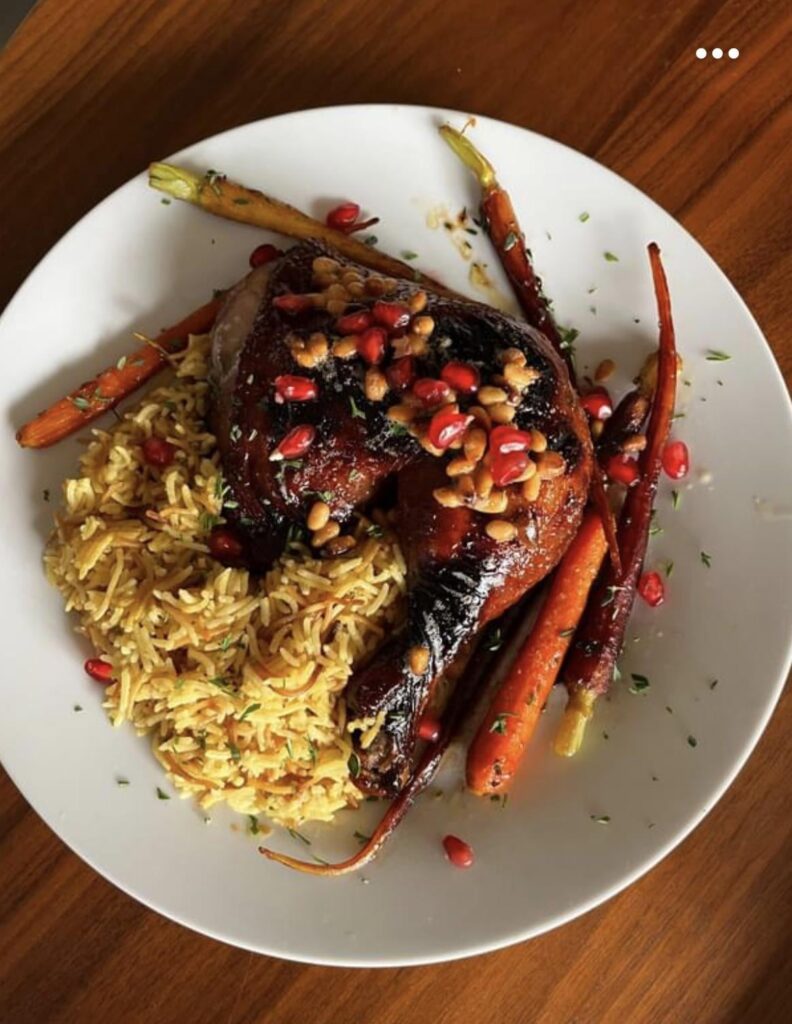 Pomegranate chicken, pine nuts with brown butter, saffron basmati pilaf, honey and thyme glazed carrots