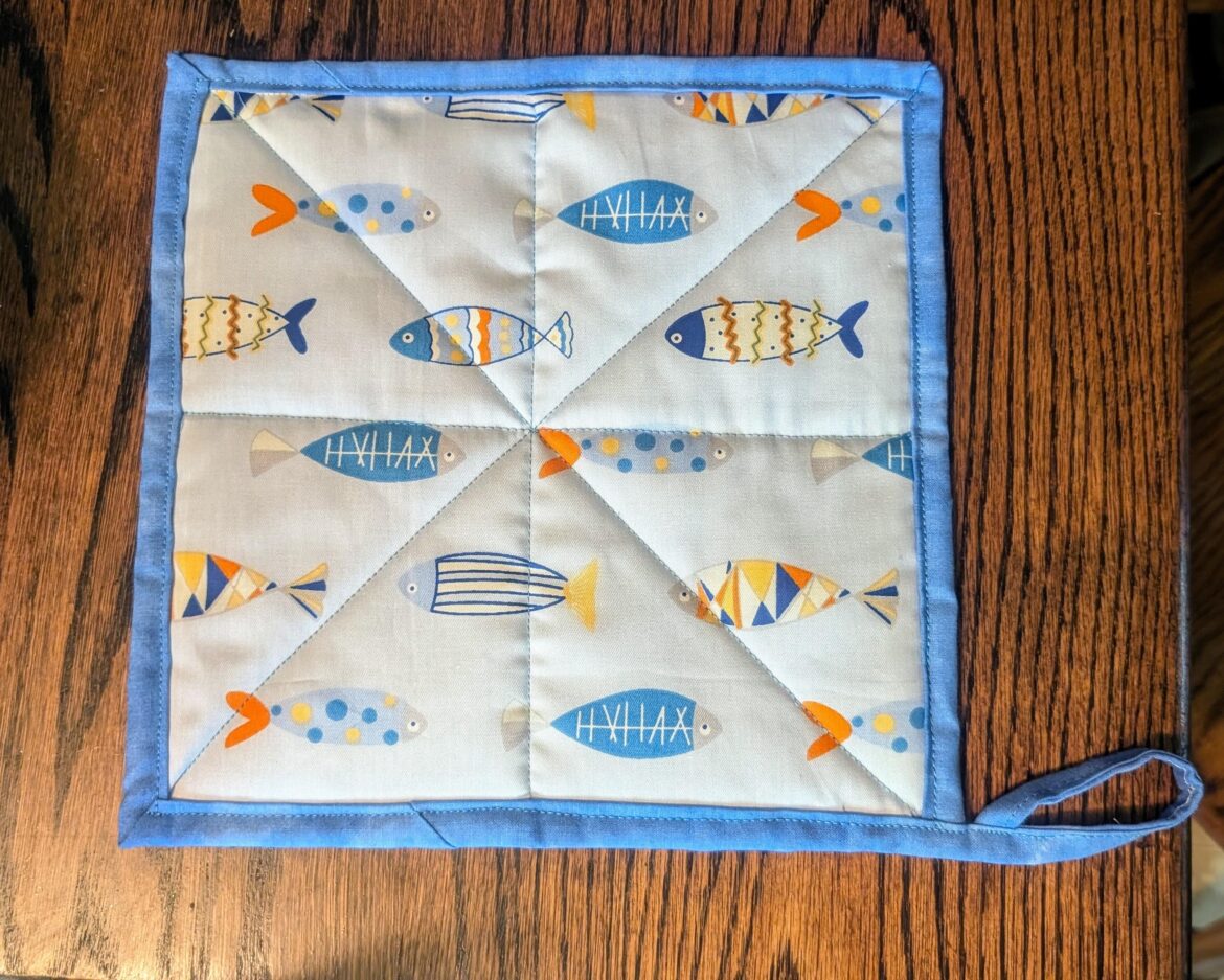 My mom handmade this lovely sardine potholder because she knows I'm a tinned fish enthusiast!