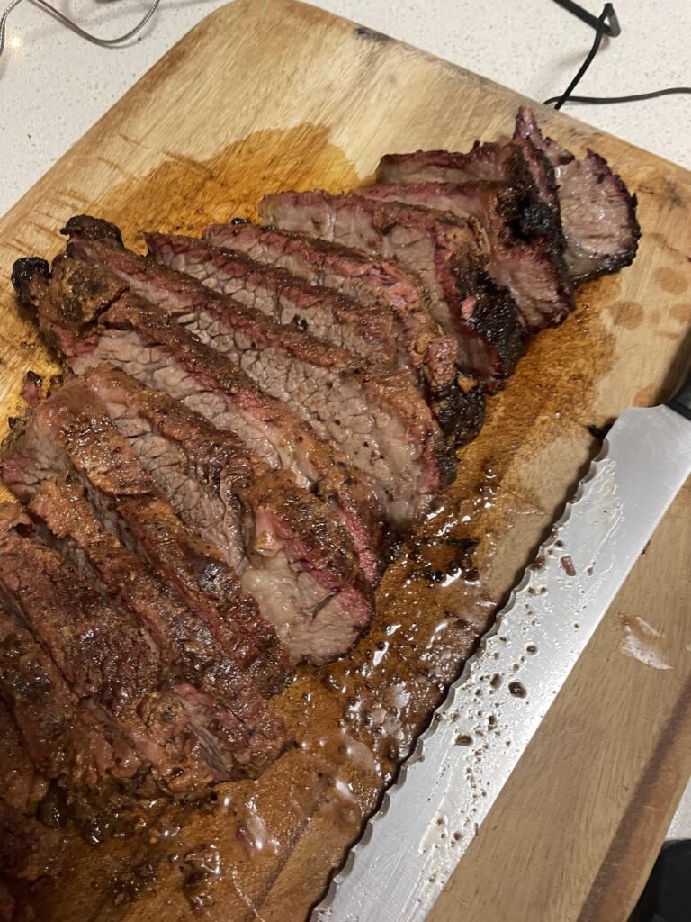 My first ever brisket and cooked it on a smoker made in the backyard