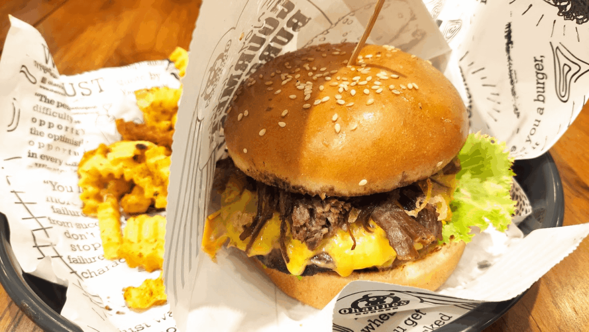 Cheeseburger with shredded bacon.