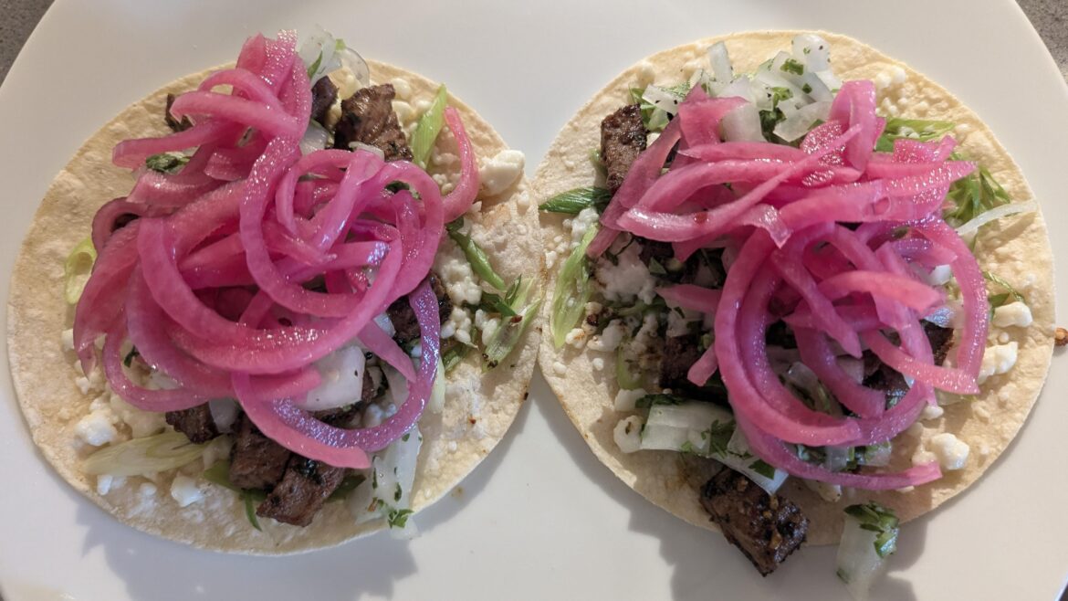 Triple onion steak tacos I made for dinner.
