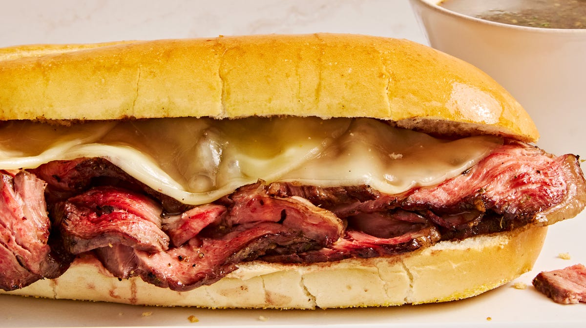 french dip sandwich served with au jus