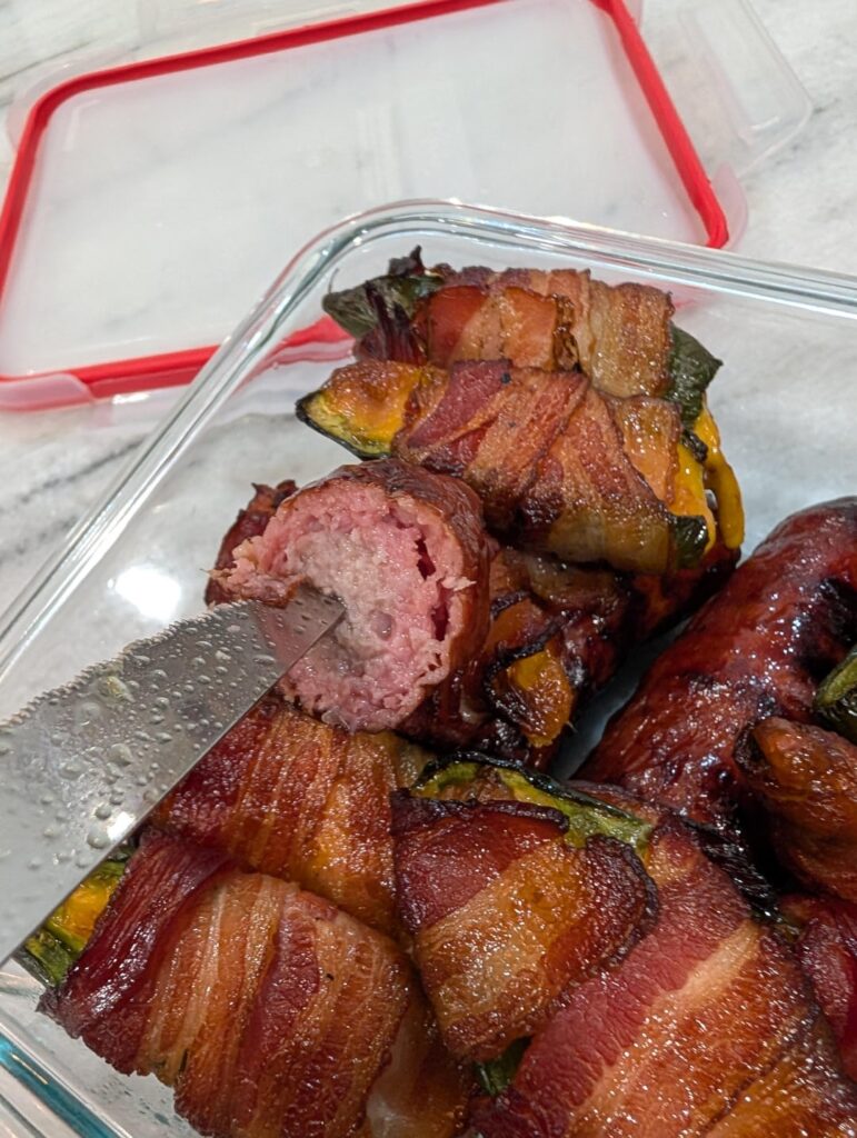 Smoke ringed brats with garden fresh fresh bacon wrapped cheddar stuffed jalapenos