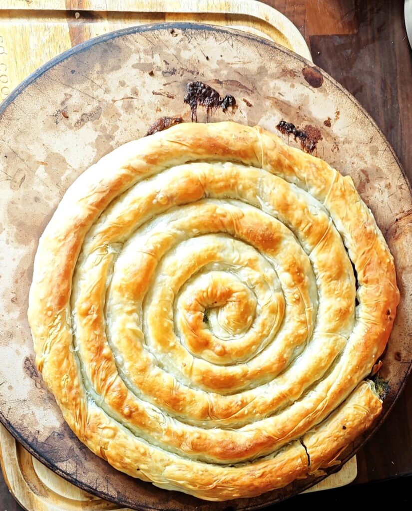 Greek style cheese and spinach swirl pie with filo pastry