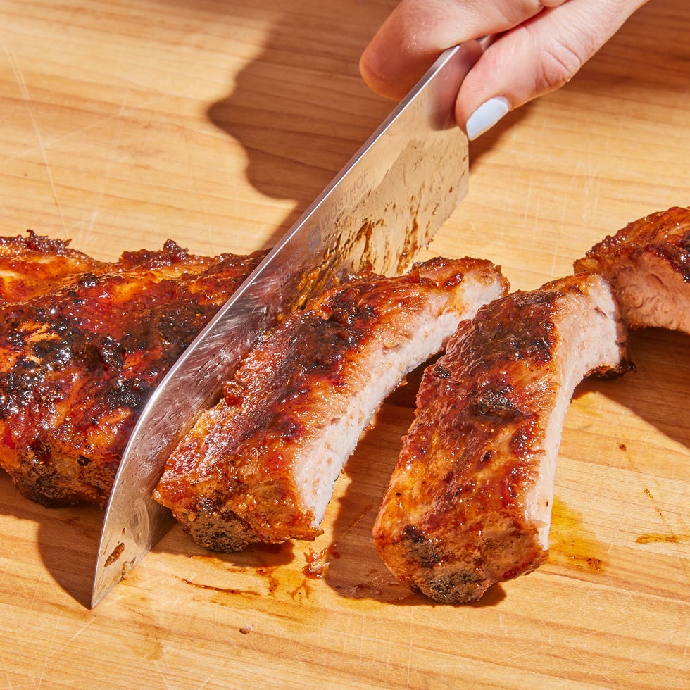 grilled ribs getting cut
