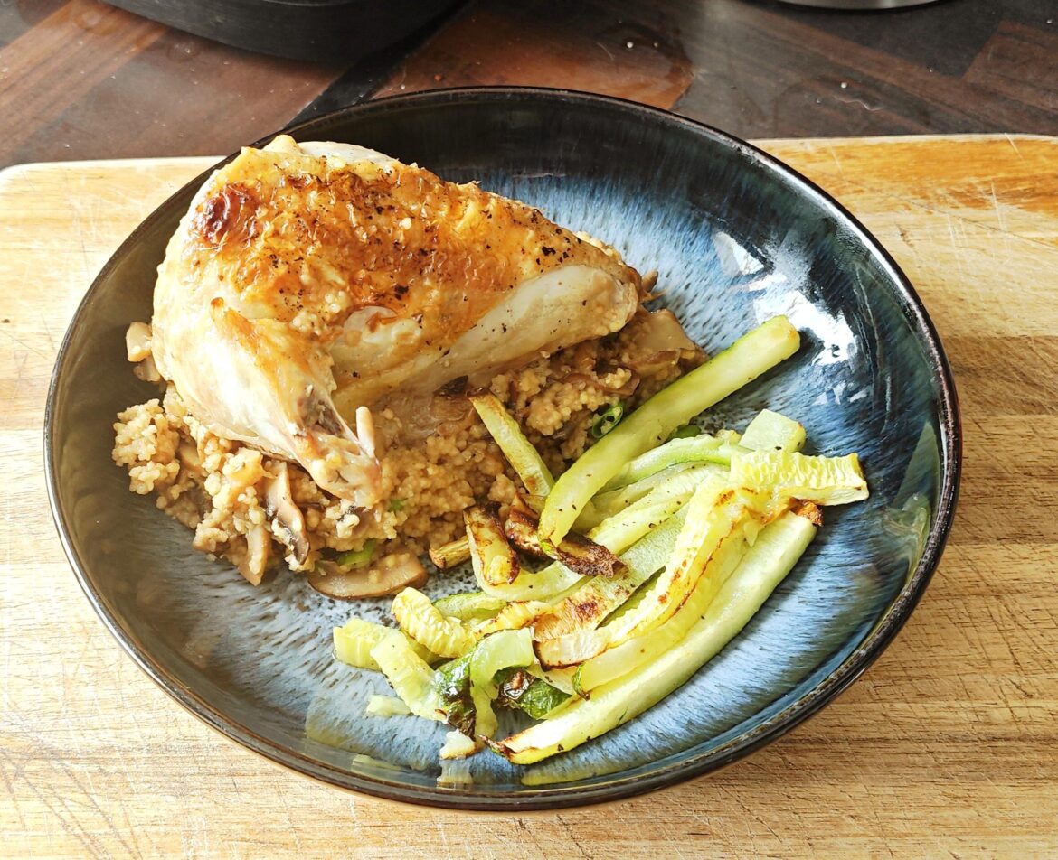 Supreme or chicken, mushroom, shallot and fresh scallion cous cous cooked in chicken bone broth, served with julienne courgette roasted with lemon oil and black pepper