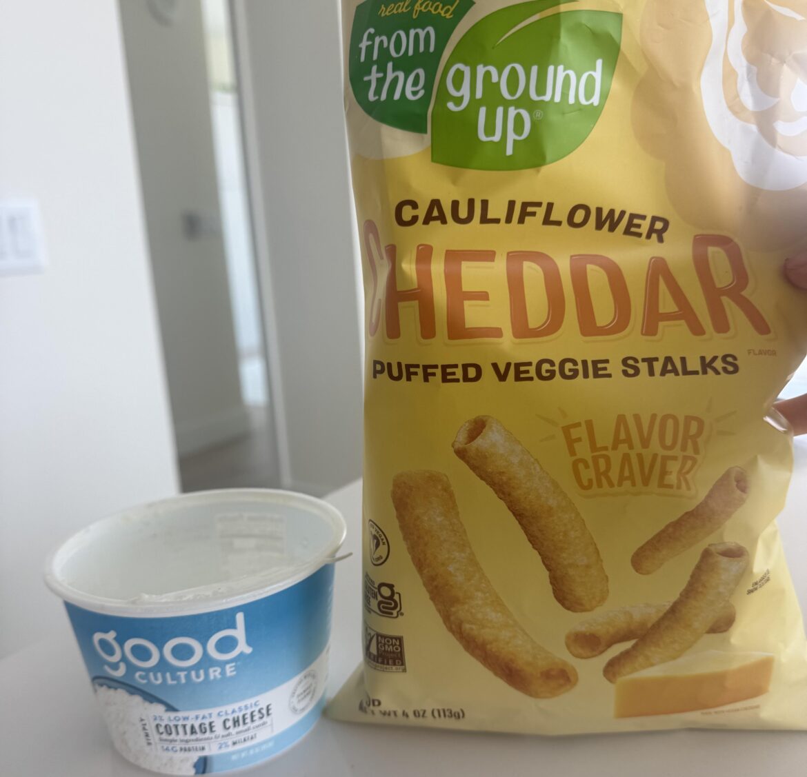 Great volume snack! Cauliflower puffs dipped in cottage cheese!