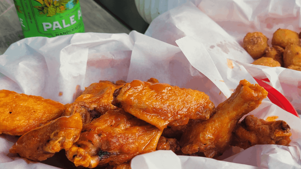 Frank's Xtra Hot and butter tonight. Grilled then fried. Cheddar cheese curds and some pale ale.