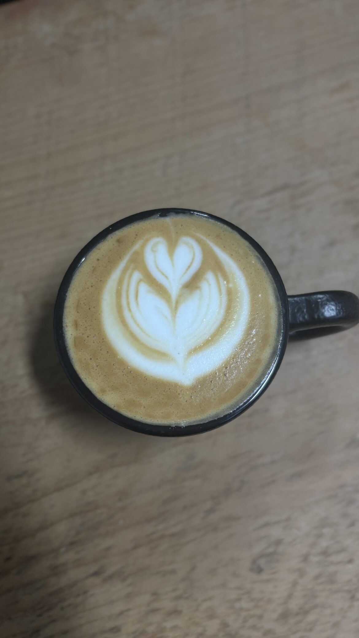 Behind the bar again.